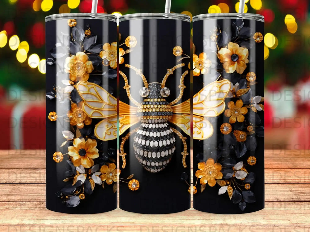 Bee design with gold flowers and black accents on a tumbler.