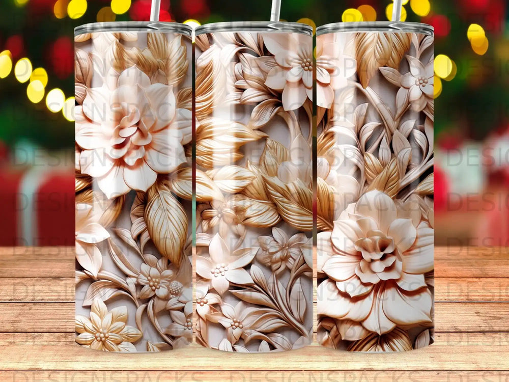 3D floral embossed tumbler with neutral and gold tones on a wood background.