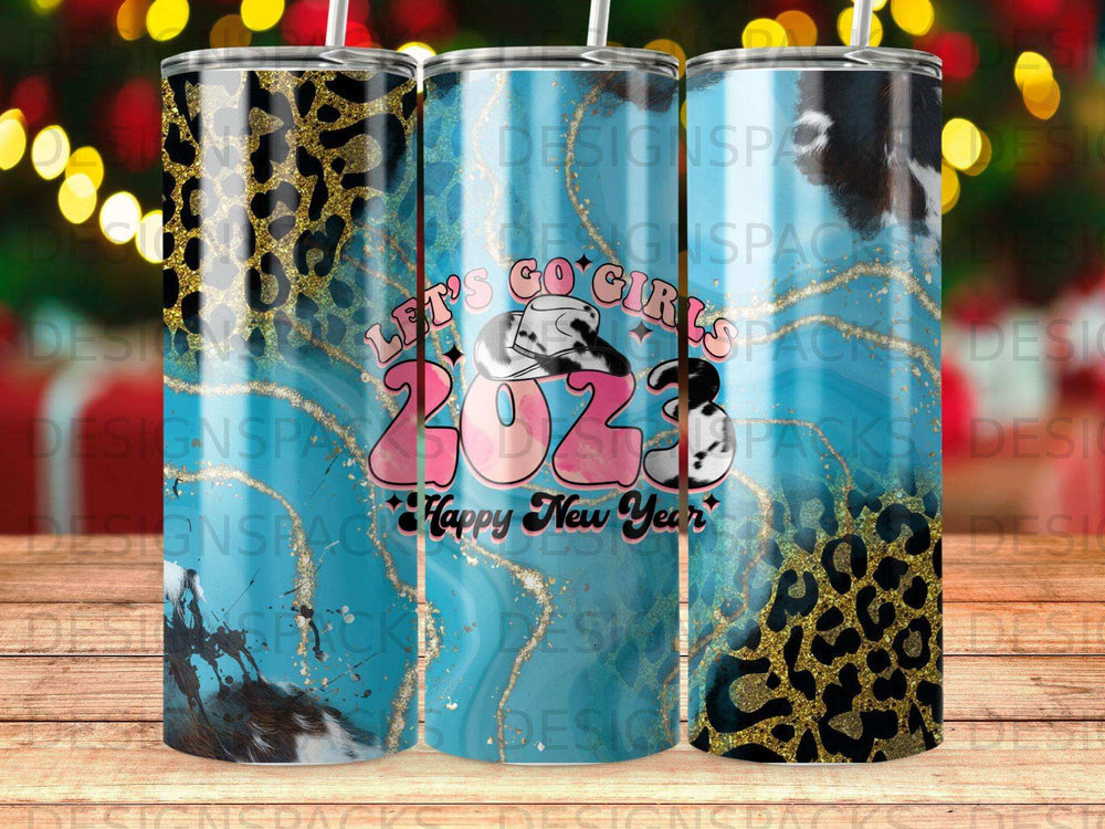 Three 2023 New Year tumblers with leopard print and cowhide designs.