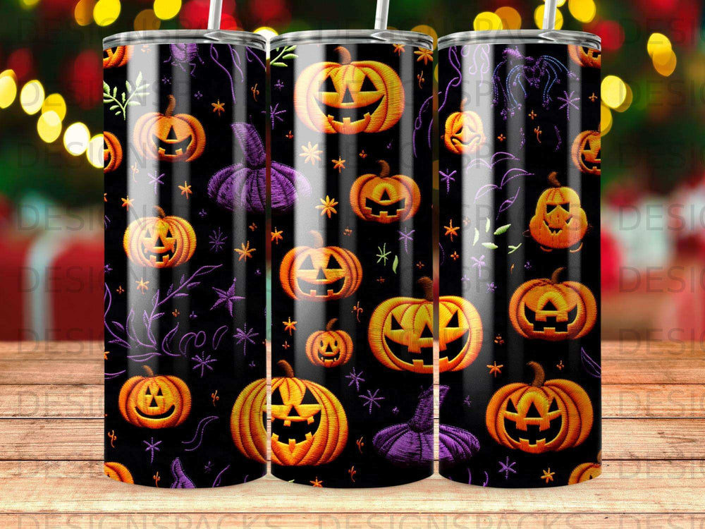 Halloween tumblers with pumpkins, bats, and stars on a black background.