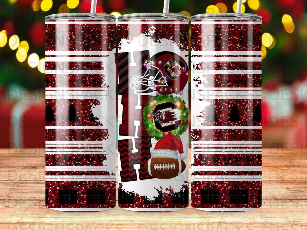 Glittering holiday tumbler with "HO HO HO" and South Carolina Gamecocks logo.