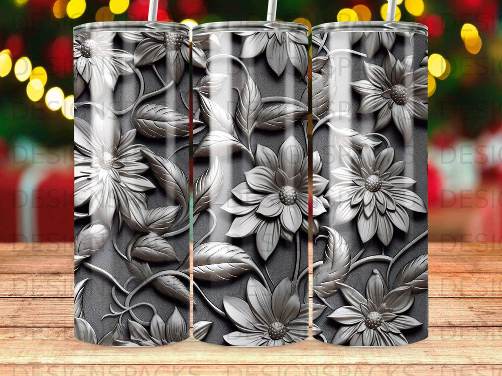 Silver floral embossed tumbler with bokeh lights background.