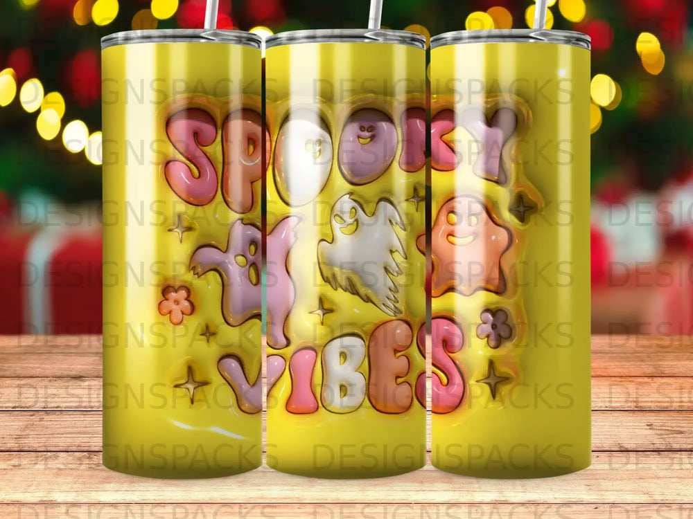 Tumbler with "Spooky Vibes" text and ghost and flower illustrations.