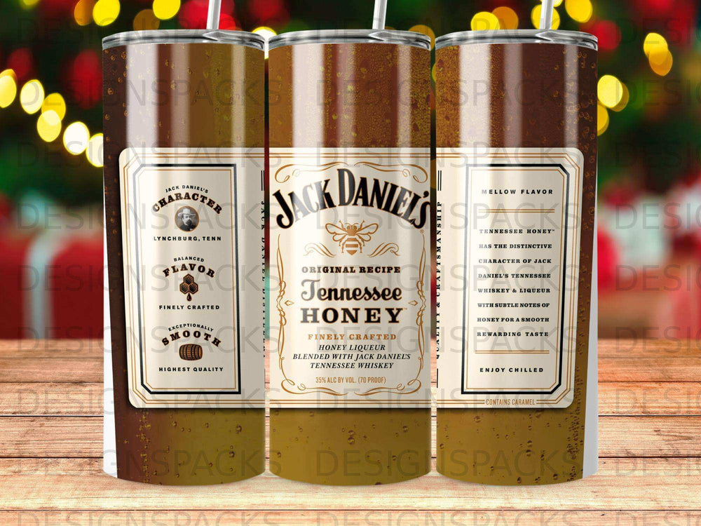 Jack Daniel's Tennessee Honey whiskey tumbler with honey and whiskey branding.