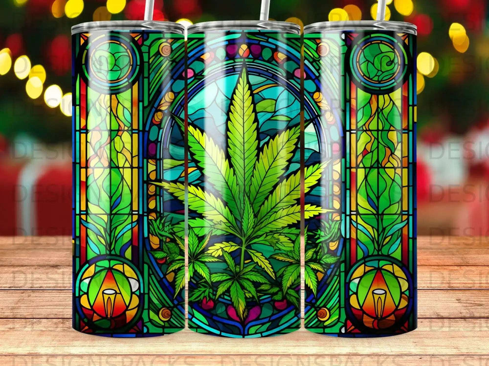 Stained glass tumbler with cannabis leaf and peace symbol design.