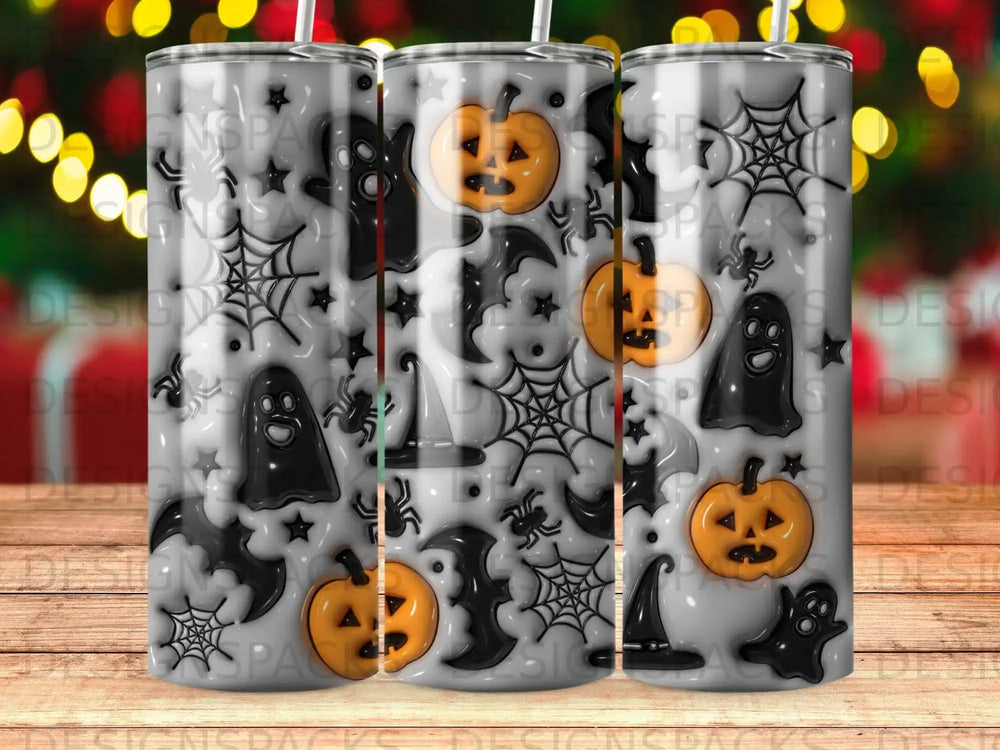 Halloween tumbler with ghosts, bats, pumpkins, and spiderwebs.