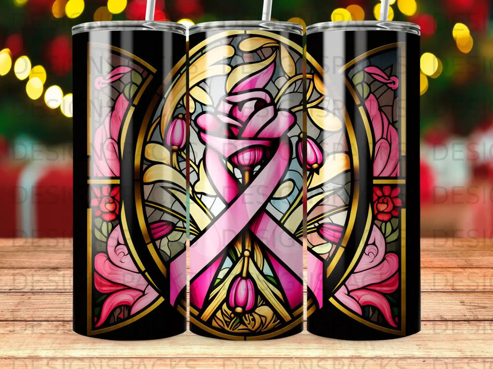 Stained glass design with pink ribbon and floral elements on a tumbler.