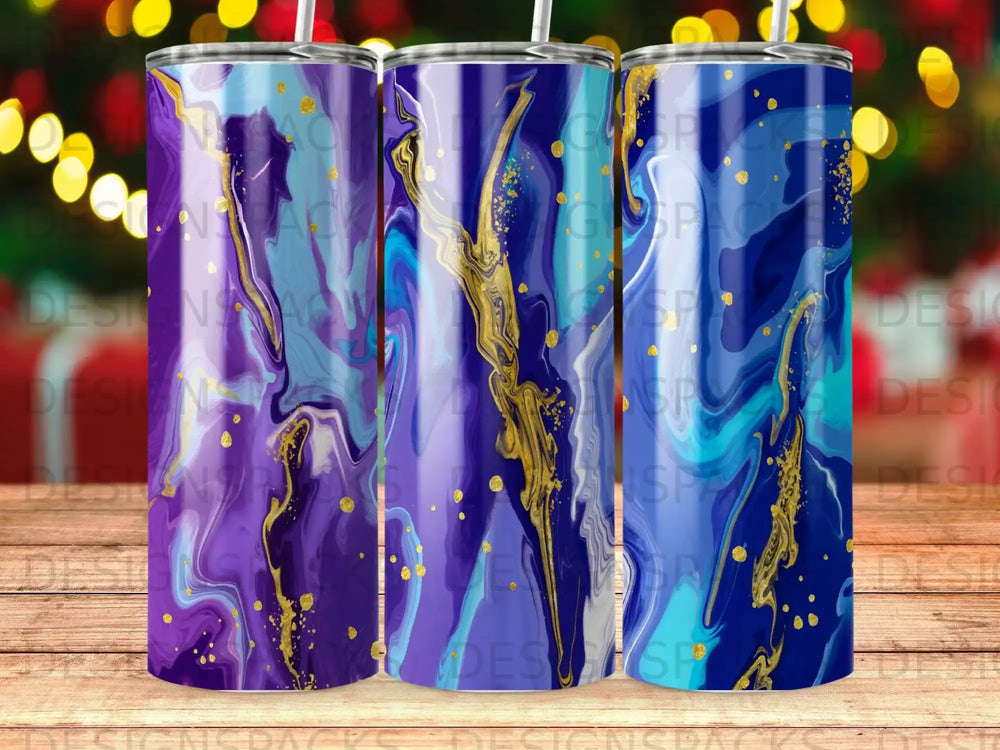 Three tumblers with a blue, purple, and gold abstract marbled design.