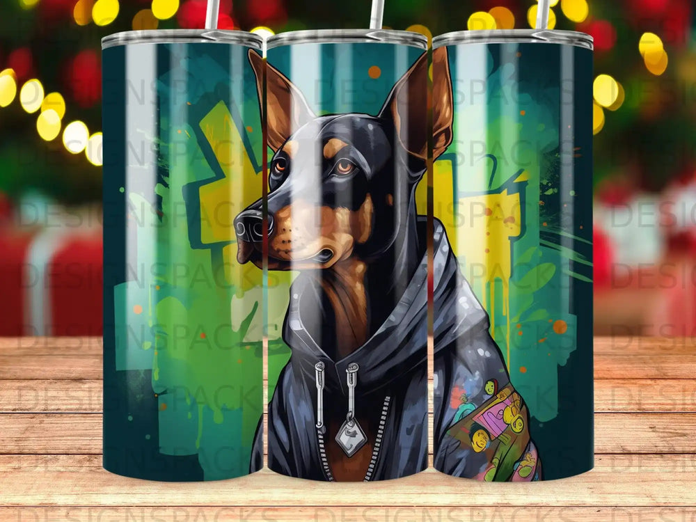 Doberman wearing a hoodie with cartoon patches, three tumblers in a row.