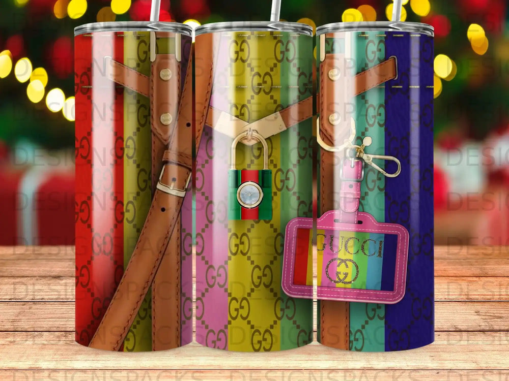 Gucci pattern tumbler with leather straps and padlock detail.
