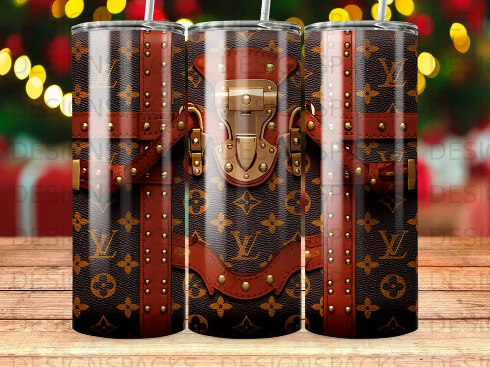 Patterned tumbler with LV monogram and buckle details.