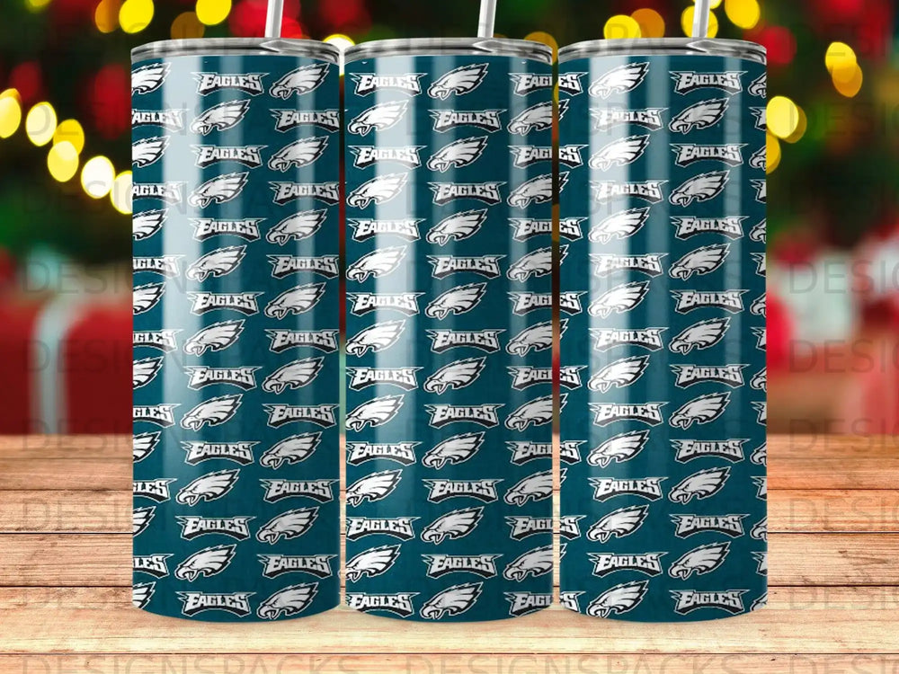 Tumbler with repeating Philadelphia Eagles logo pattern on dark blue background.