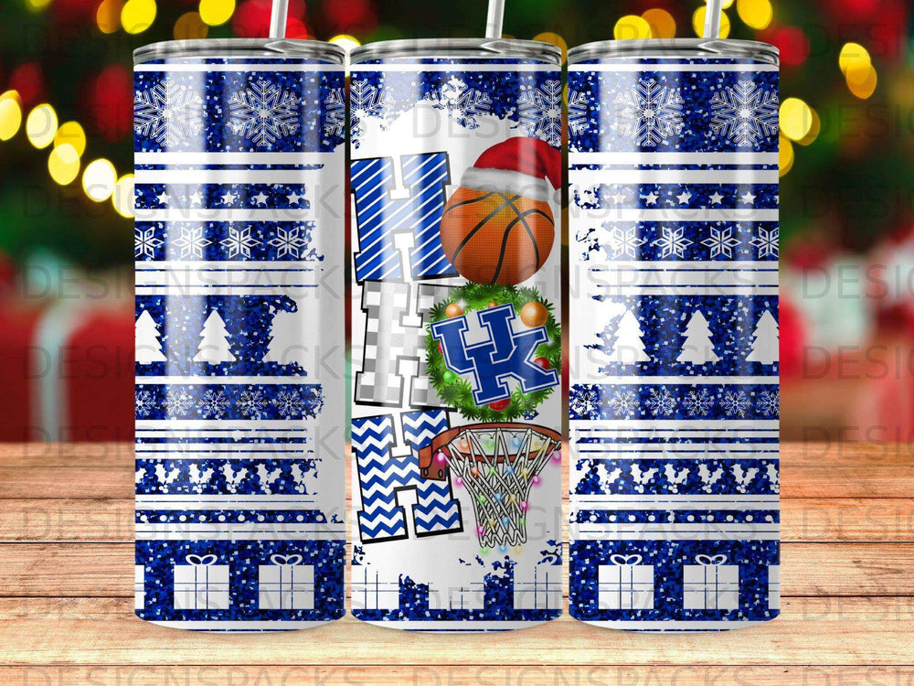 Blue and white snowflake pattern tumbler with "UK" in basketball and wreath, and Santa hat.