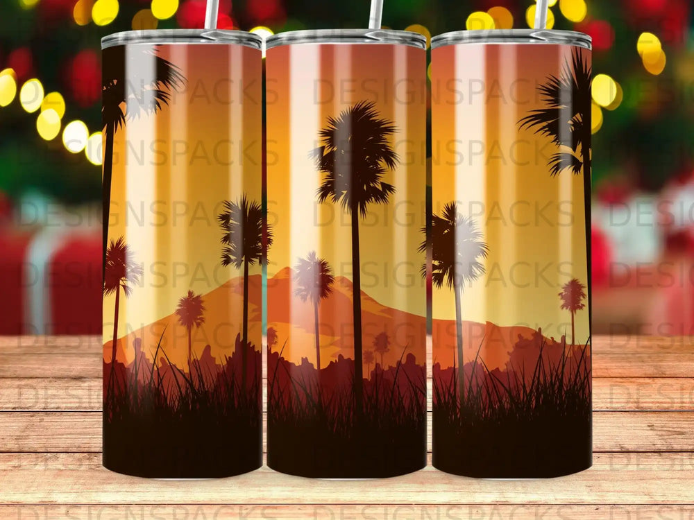 Silhouetted palm trees and grass against a warm, gradient sunset.