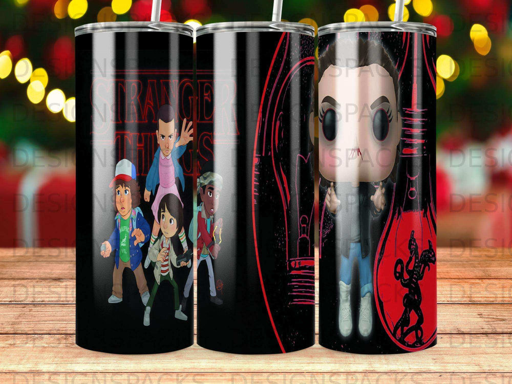 Stranger Things characters and Demogorgon graphic on a black tumbler.