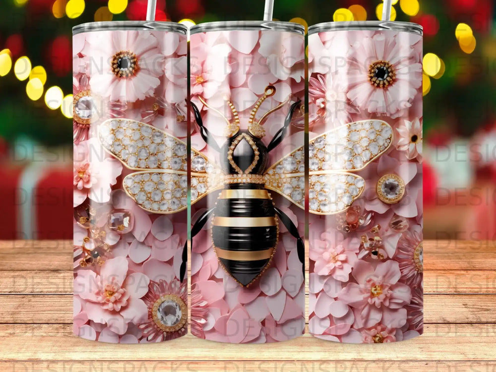 Pink floral tumbler with a jeweled bee design.