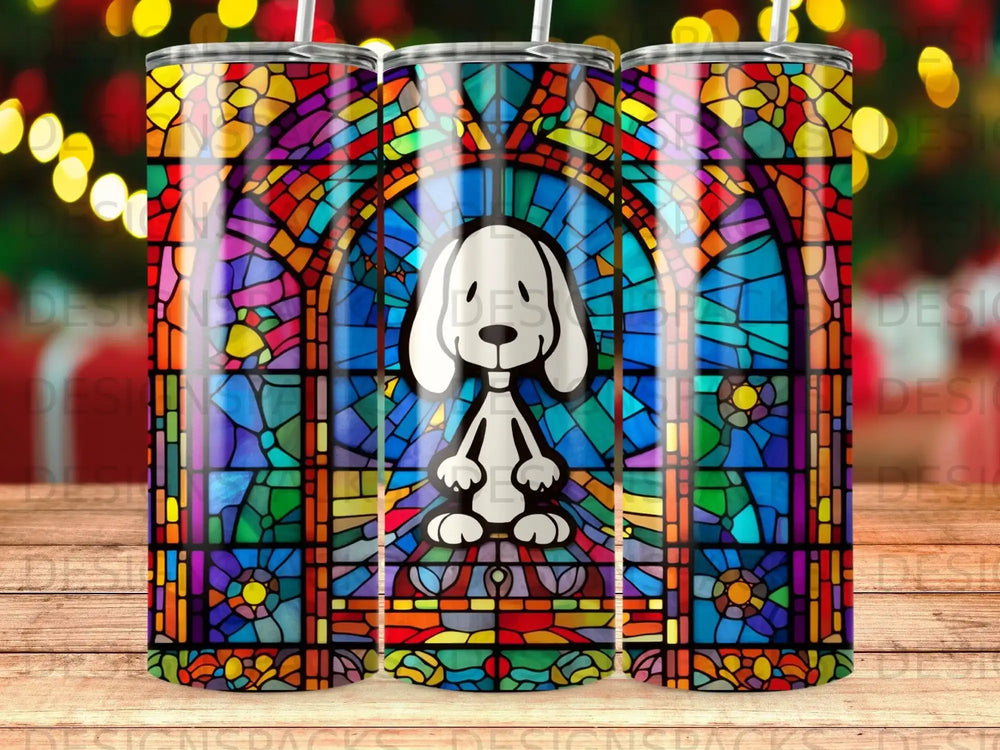 Snoopy sits in front of a colorful stained glass window.