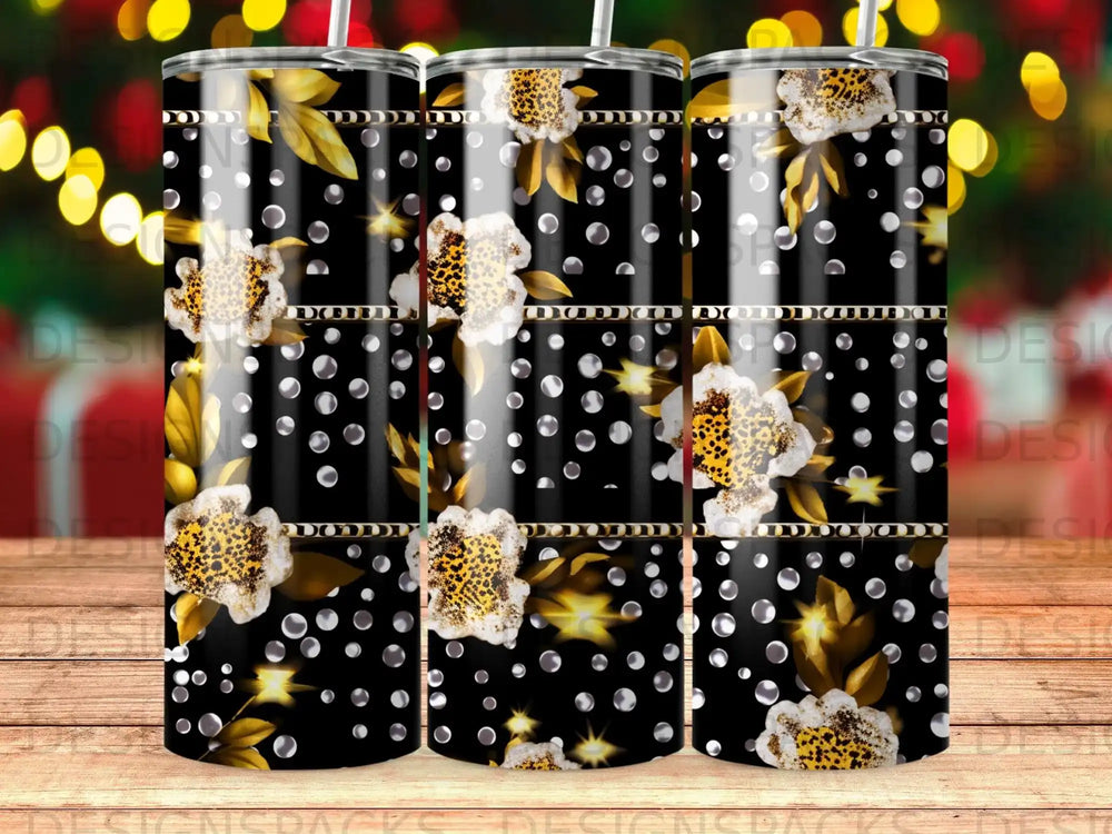 Black tumbler with leopard print flowers and gold leaf accents.