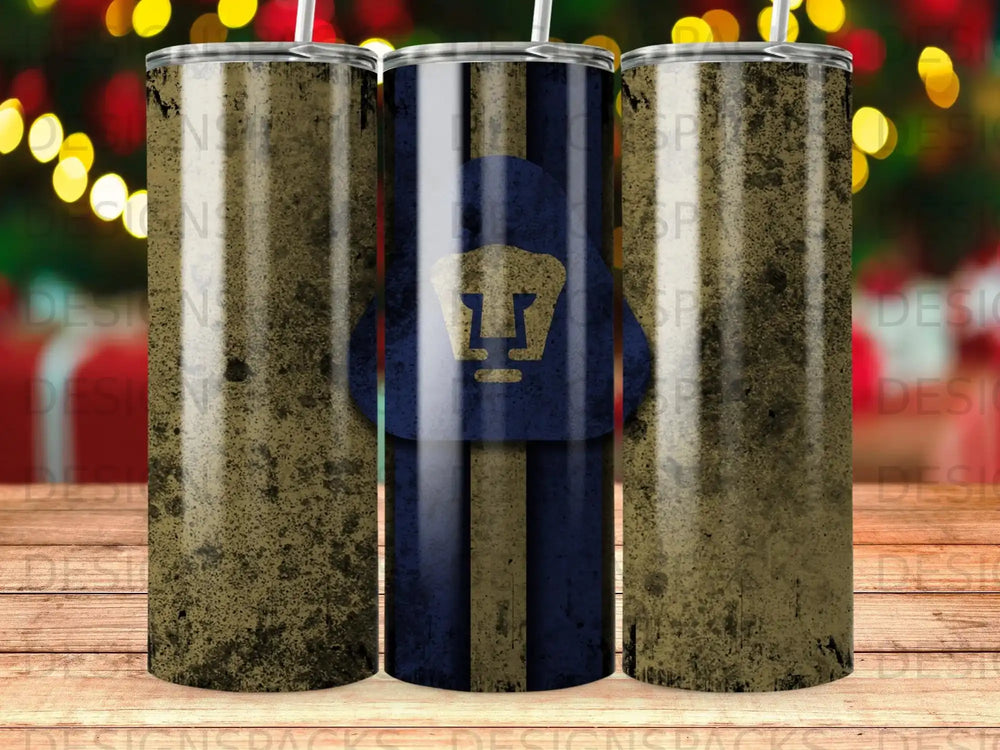 Pumas UNAM logo on distressed navy and gold striped tumbler.