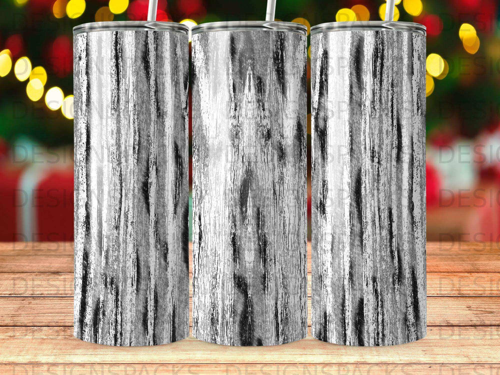 Three tumblers with a brushed silver wood grain pattern.