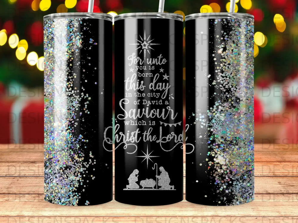 Black tumbler with glitter and Christmas nativity scene, "Savior Christ the Lord" text.