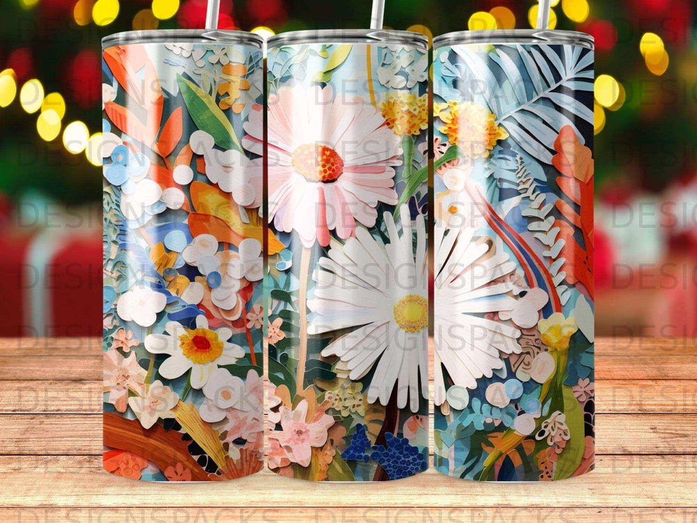 Three tumblers with a vibrant floral and leaf pattern.