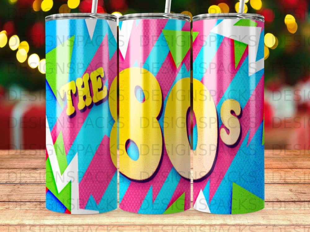 Tumbler with colorful geometric pattern and "The Designspacks" text.