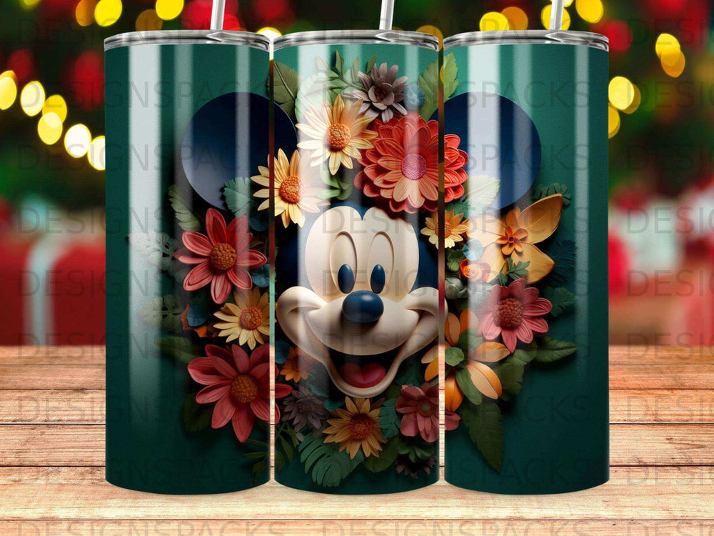 Mickey Mouse with a floral crown on a green patterned tumbler.