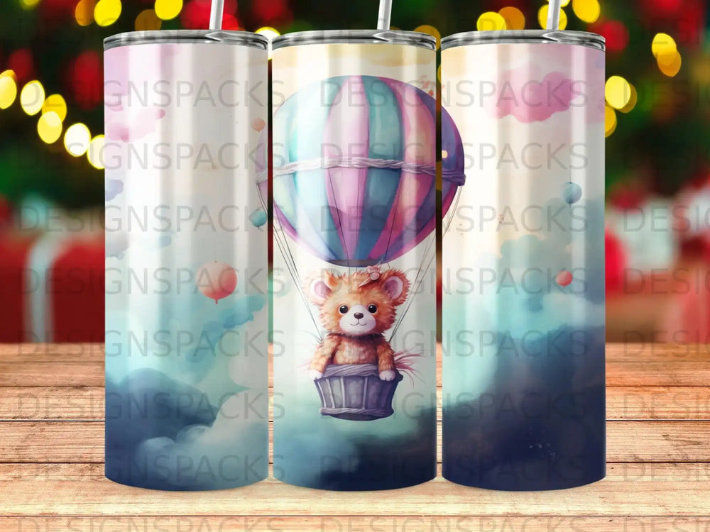 Teddy bear in hot air balloon with "DESIGNSPACKS" watermark.