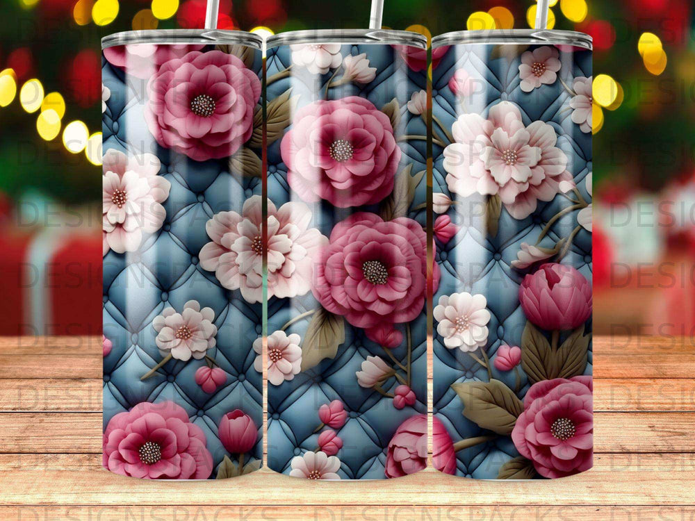 Pink and white floral pattern on a quilted blue background.
