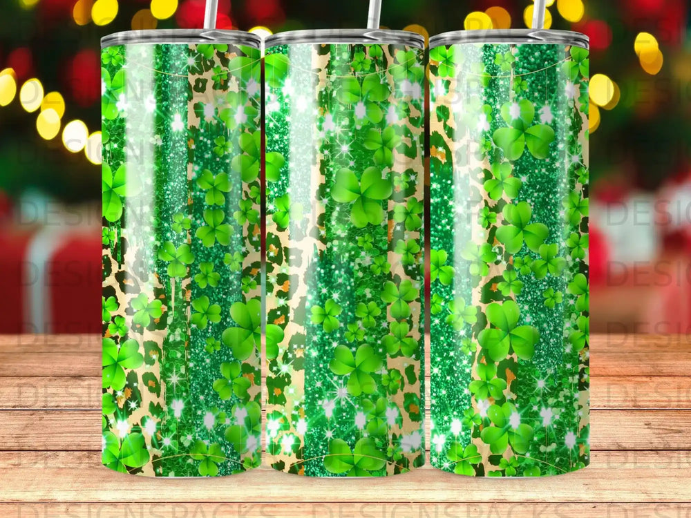 Green tumbler with shamrocks, leopard print, and glitter accents.