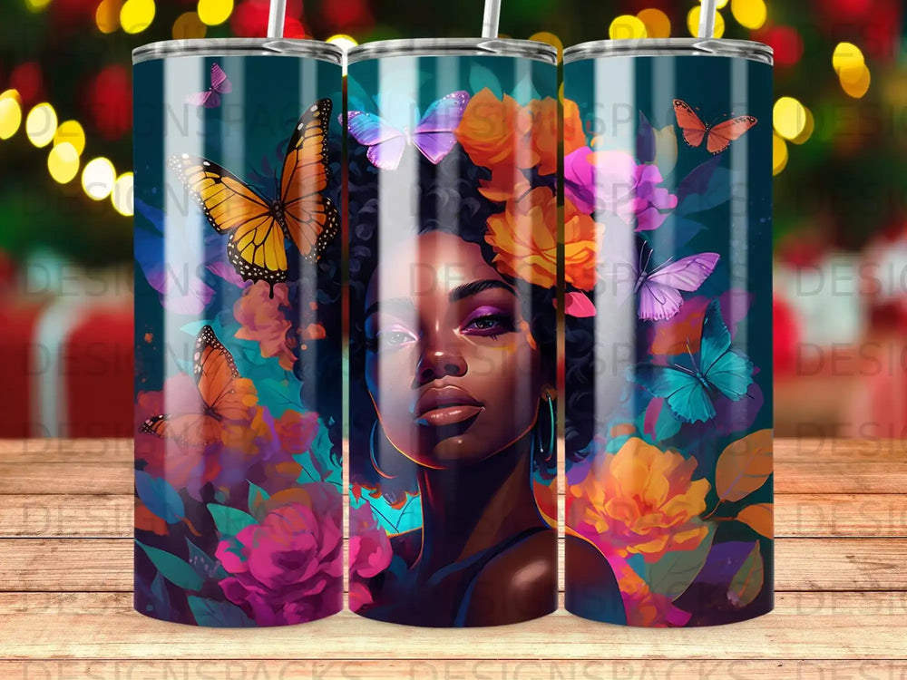 Woman with butterflies and flowers, colorful, vibrant artwork on a tumbler.