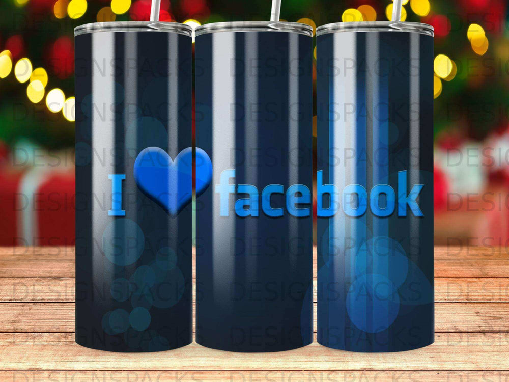 Blue tumbler with "I ❤️ Facebook" design on a blurred background.
