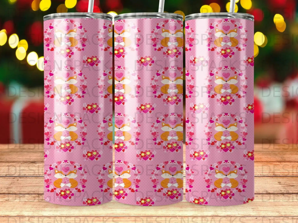 Pink tumbler with repeating pattern of foxes and hearts.