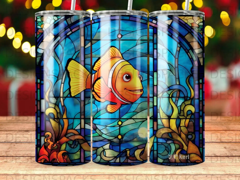 Stained glass tumbler with clownfish and underwater plants.