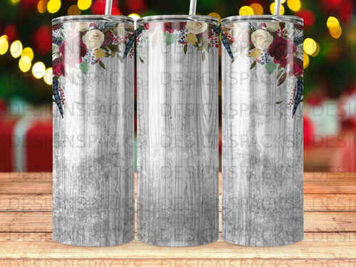 Tumbler with wood grain and floral design, featuring roses and feathers.