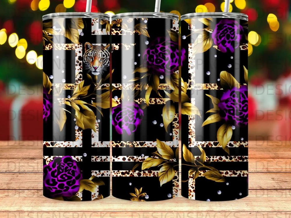 Tumbler with tiger face and floral pattern on black background.