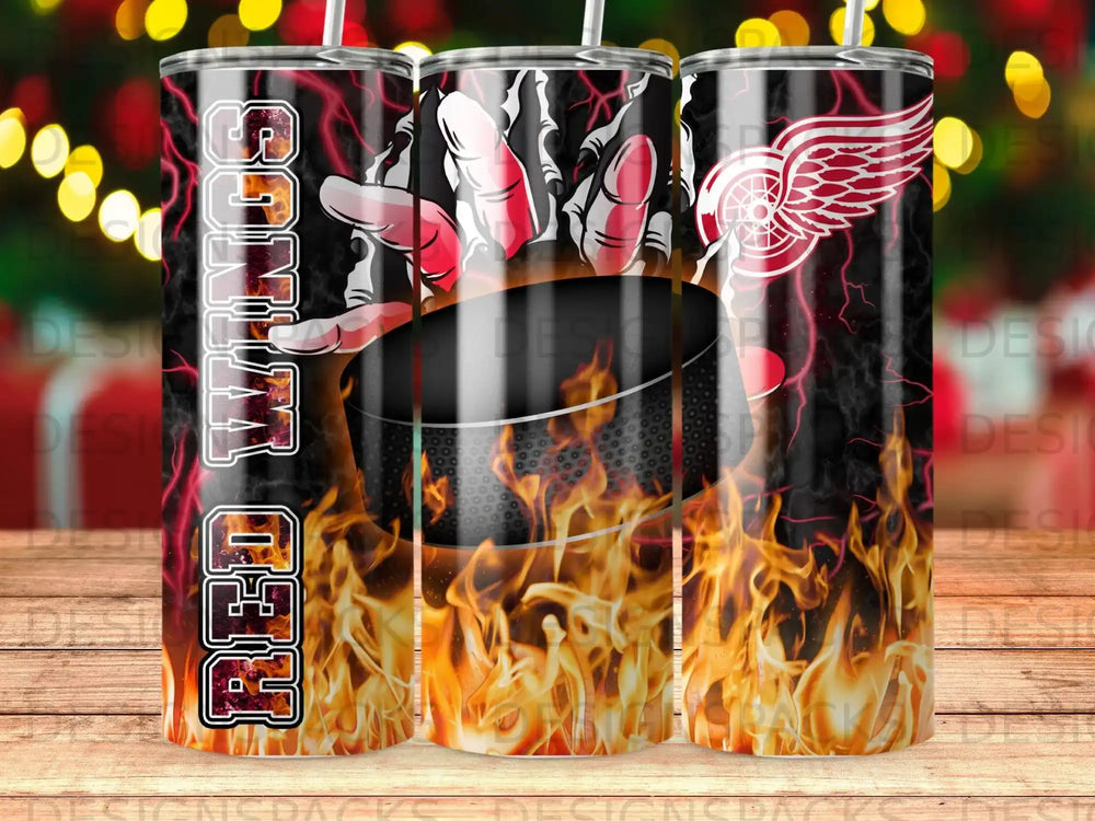 Detroit Red Wings logo and text on a fiery background tumbler.