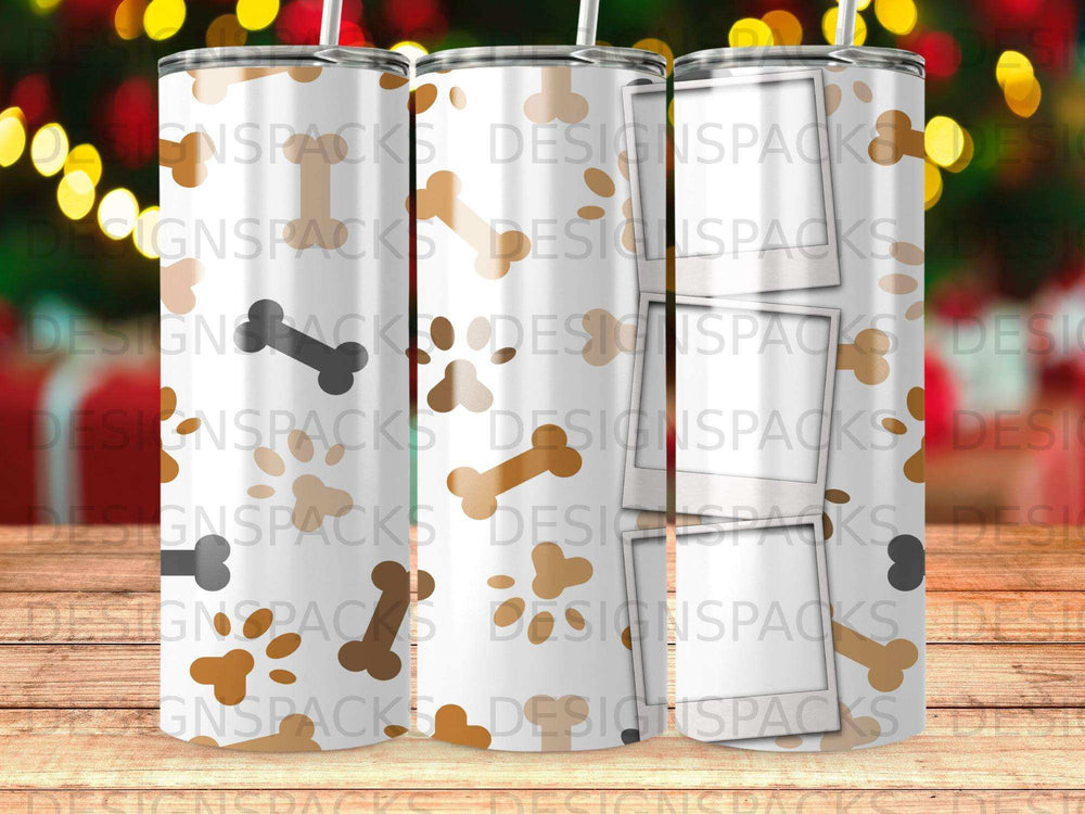 Tumbler with scattered bone and paw print patterns and "DESIGNSPACKS" watermark.