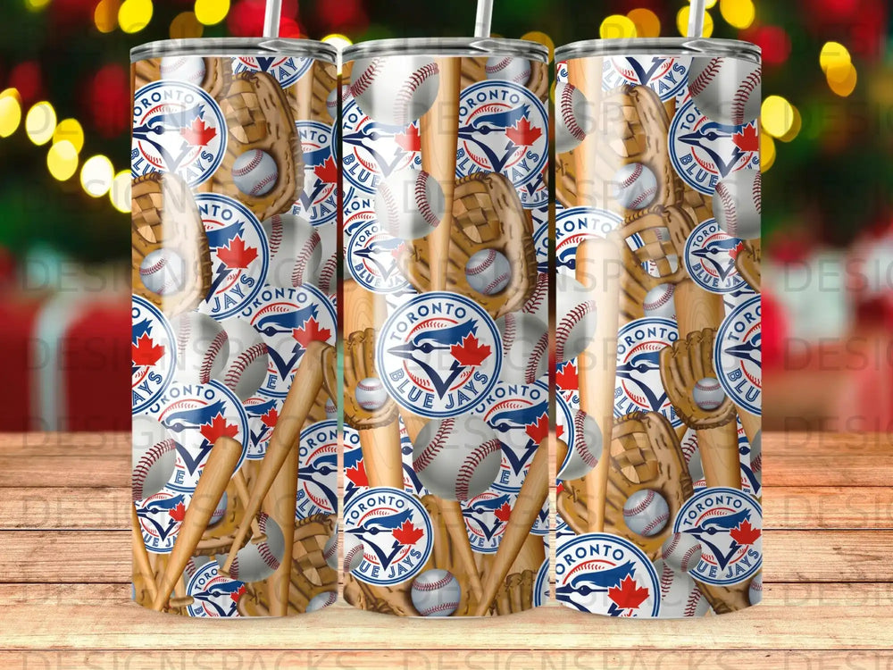 Toronto Blue Jays baseball pattern tumbler with blurred bokeh background.