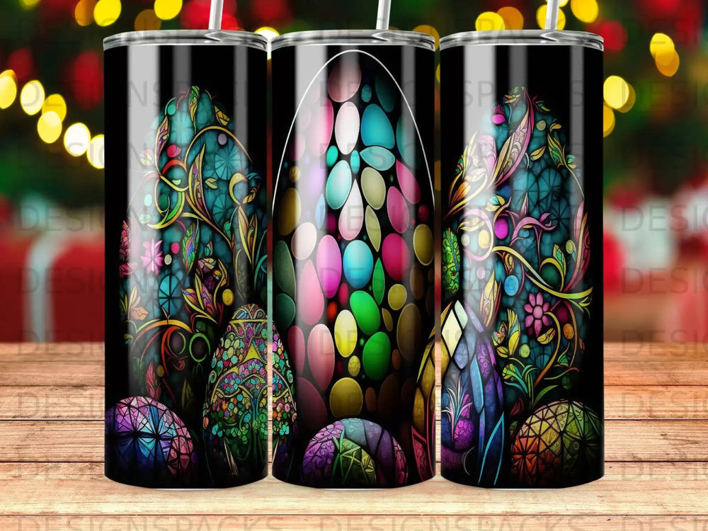 Colorful Easter egg designs with floral and geometric patterns on black tumblers.