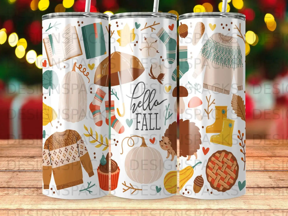 Fall themed tumbler with pumpkins, leaves, apples, and cozy sweaters.