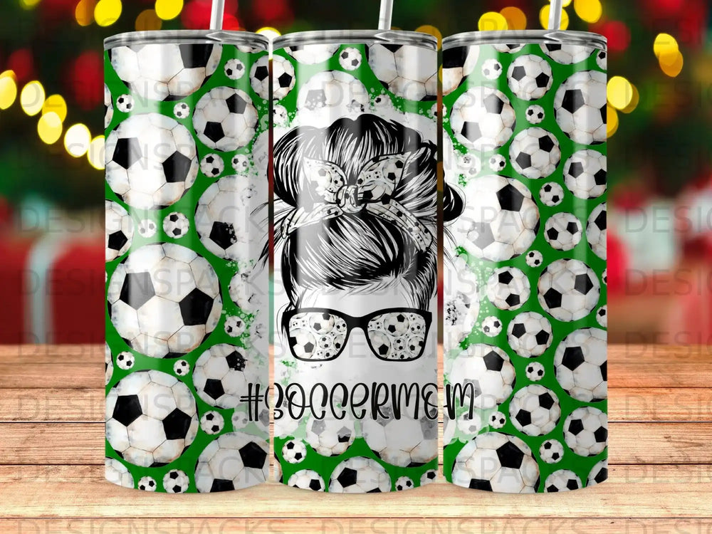 Soccer mom tumbler with glasses and a messy bun, surrounded by soccer balls.