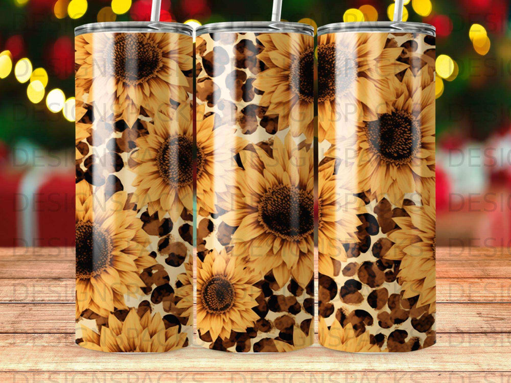 Sunflower and leopard print tumbler with blurred festive lights in the background.