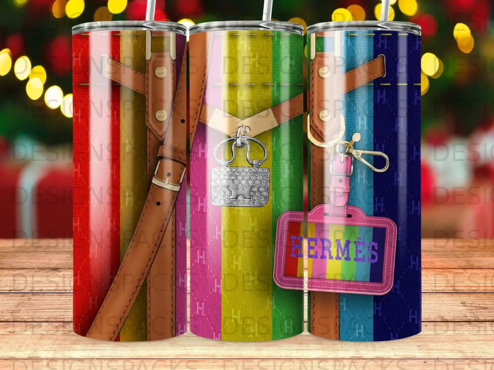 Tumbler with Hermes print and a green and pink tag.
