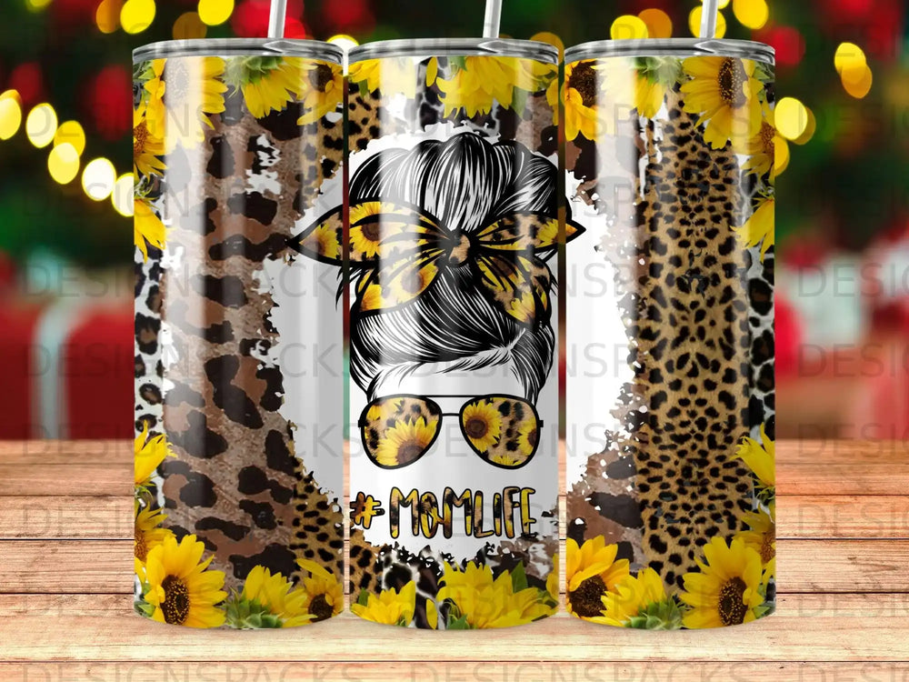 Sunflower and leopard print tumbler with #MomLife graphic and sunglasses.
