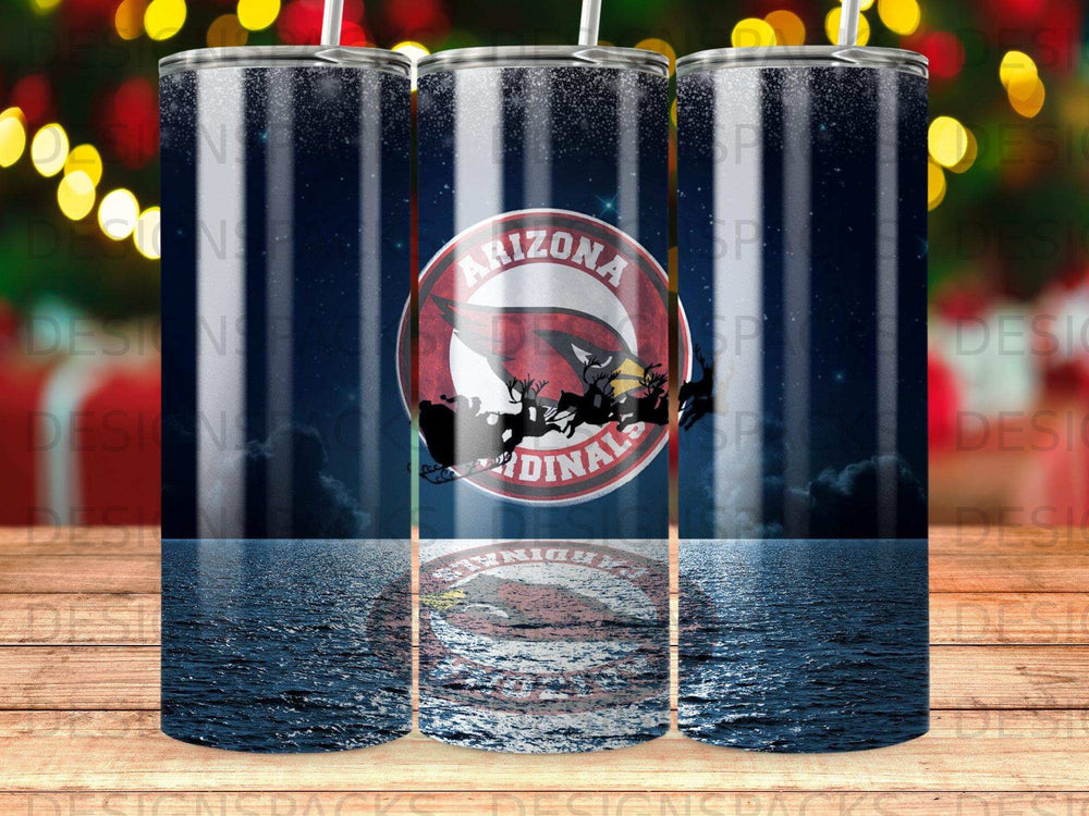 Arizona Cardinals logo with Santa in sleigh above starry night and water reflection.