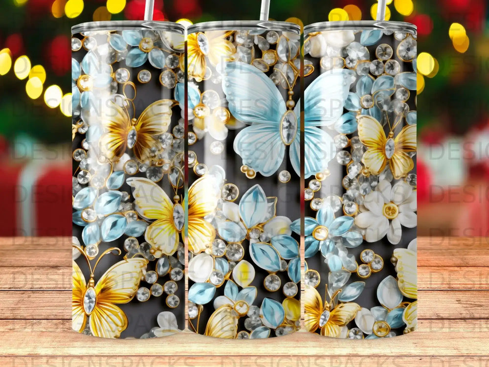 Butterflies and flowers with gemstones on a black tumbler.