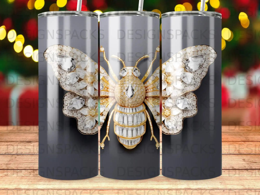 Bee tumbler with crystal wings and gold accents on a dark background.
