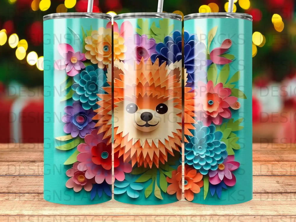 Pomeranian dog with colorful floral design on teal tumbler.